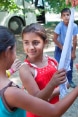 Roma young girls participating in games at summer camps organised by Swiss-supported project.