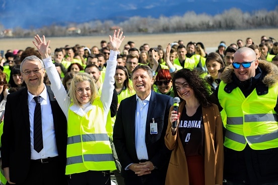Swiss Ambassador Adrian Maître with the organisers of the 'Taken by Albania' campaign at Tirana International Airport.