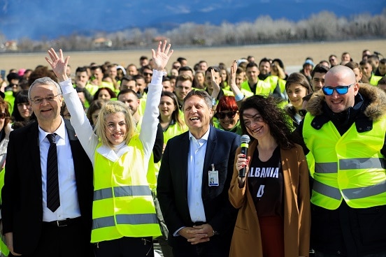 Swiss Ambassador Adrian Maître with the organisers of the 'Taken by Albania' campaign at Tirana International Airport. 