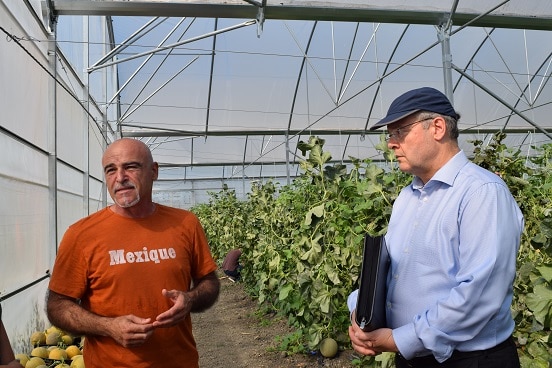 Swiss Ambassador Adrian Maître (right) meeting agribusiness representatives during field visit in Lushnje, 19.06.2019. ©