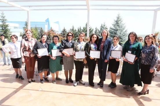 Ambassador Muriel Peneveyre with awarded women for their recently successfully completed business training.