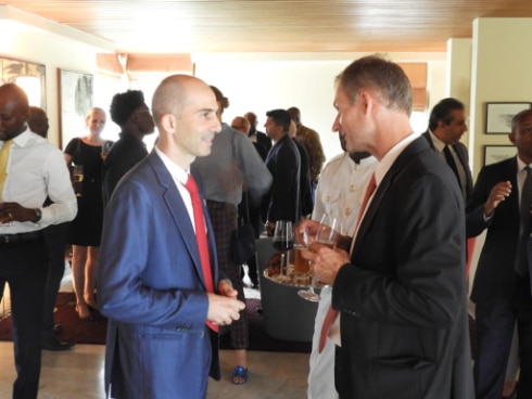 Ambassador Stalder (right) interacting with some Swiss business owners