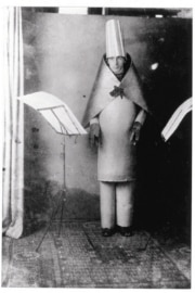 Hugo Ball in costume at the Cabaret