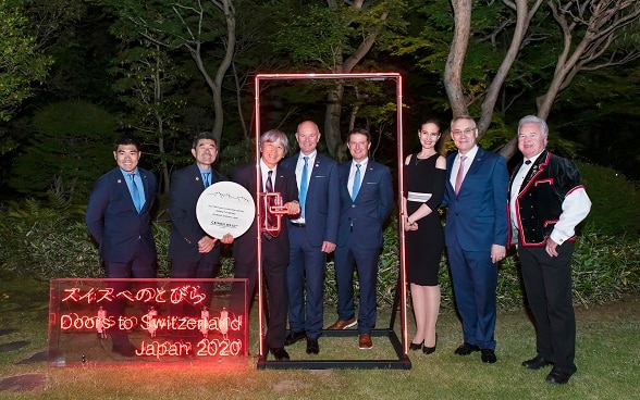 (From left) Mr. Ikko Ando (Japanese Information Bureau), Mr. Ichiro Ando (Japanese Information Bureau / Director), Mr. Isamu Tatsuno (Montbell / CEO), Mr. Peter Egger (Jungfrau Region Tourism / President), Mr. Bruno Hauswirth (Grindelwald Tourism / Managing Director), Dr. Yulia Gusynina Paroz, Ambassador of Switzerland to Japan, Mr. Jean-François Paroz, Mr. Sämi Zumbrunn (Yodeller) ©Embassy of Switzerland in Japan