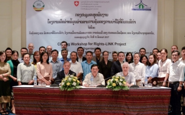 Mr. Tim Enderlin, Ms. Michal Harari, Mr. Senthong Phothisane of SDC and the participants of the Rights-Link closing workhsop.