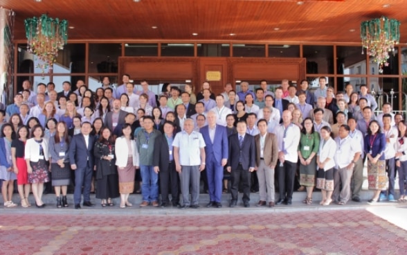 Mr. Tim Enderlin and participants of the Mekong Region Land Governance project conference on Large Scale Agriculture Investment.