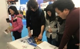 Interested visitors at the Swiss Booth