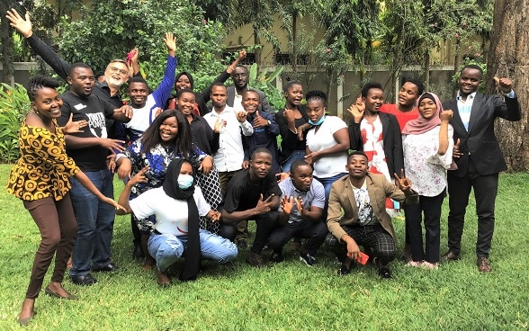 Swiss Head of Cooperation Mr. Leo Näscher (3rd left), Programme Officer and Youth focal person at the Embassy Ms. Esther Majani (1st left) together with the YSB and Board facilitators from Restless Development.