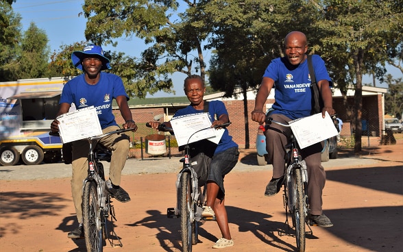Bicycles for community Childcare Workers in Zimbabwe are more than just two wheels – they can save children’s lives. Rosemary Manene (centre) says that with her new bicycle she will now do more to reach out to vulnerable children in her community and beyond.
