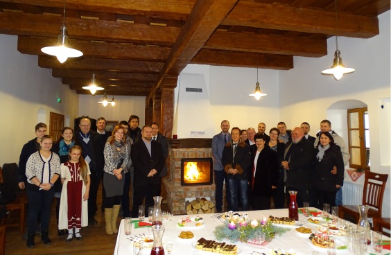 Local officials pose for the camera in a hall during the reception to inaugurate new tourist attractions. 