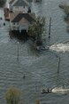 Aerial shot of flooding in the United States. People can be seen travelling around in boates.