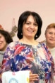 Portrait photo of Srbuhy Grigoryan, an Armenian journalist who was able to take part in her town’s mayoral elections.