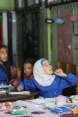 a classroom with young female students