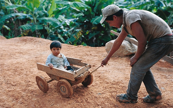 Father playing with his child in Bolivia