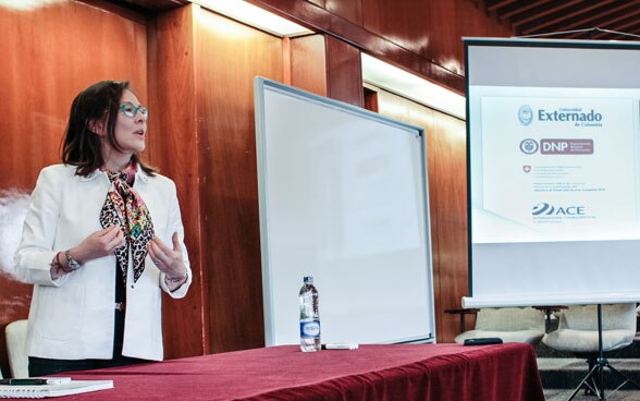 A woman giving a presentation