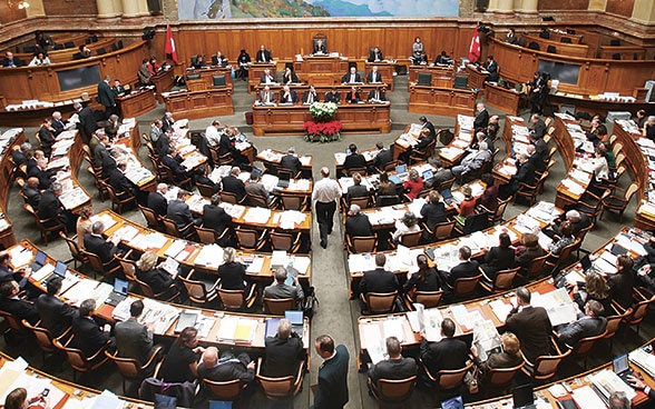 Interior view of the parliamentary session in the Federal Palace in Bern.
