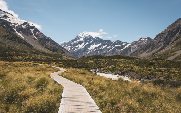 On the Hooker valley track with mountains in the background