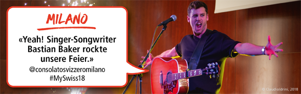 Bastian Baker an einem Konzert  in Mailand, auf dem Bild twitter adresse, @consolatosvizzeromilano, #MySwiss18