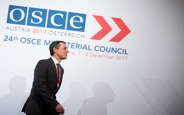Le chef de la diplomatie suisse Ignazio Cassis se rend à une séance de l’OSCE en 2017.