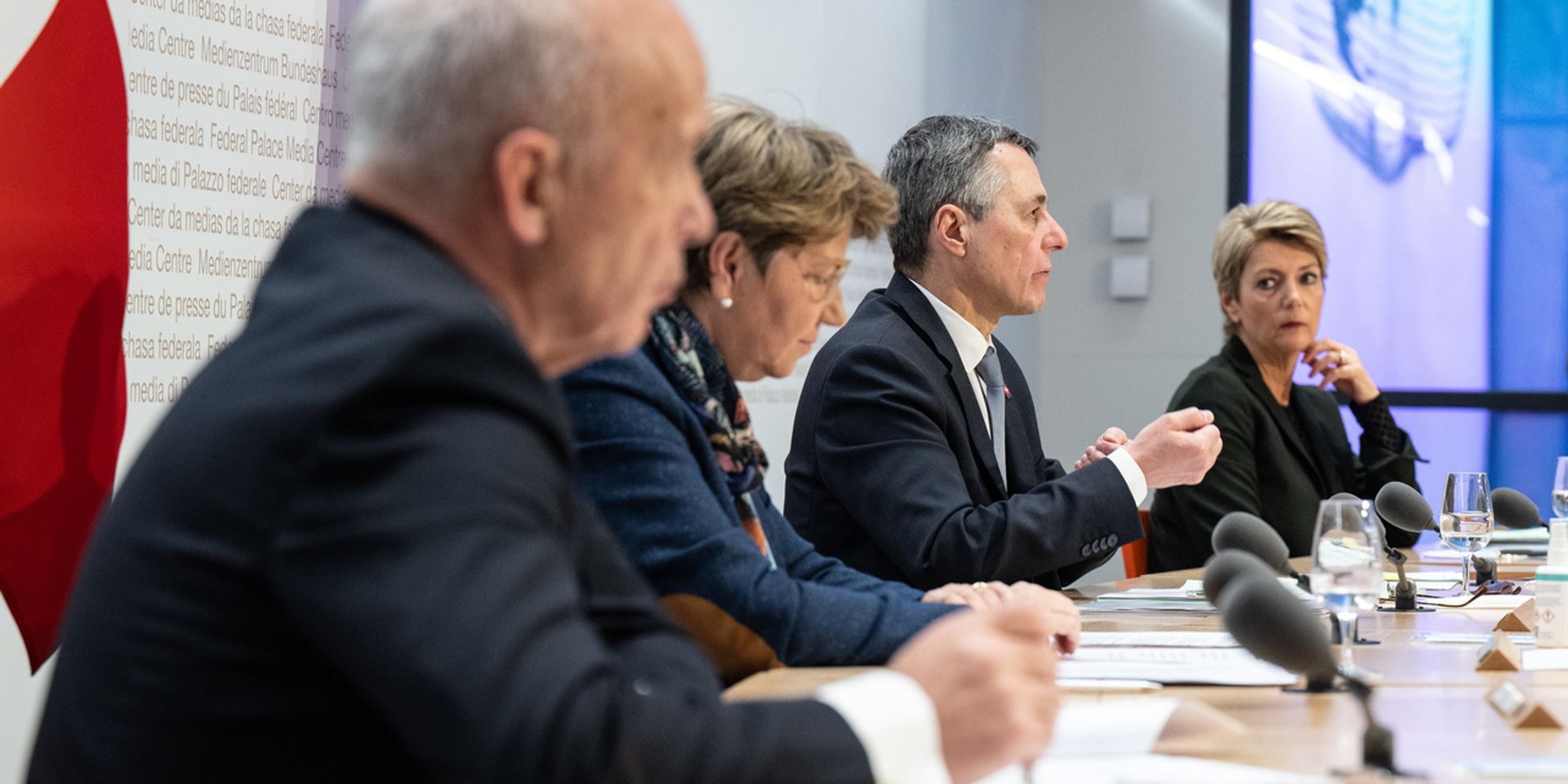 Four members of the Federal Council sit at a large desk. President of the Swiss Confederation Ignazio Cassis is talking.