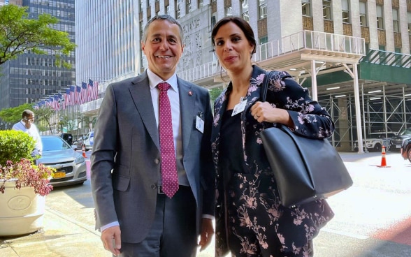 President Ignazio Cassis and Liechtenstein's Foreign Minister Dominique Hasler stand on a walkway in New York.