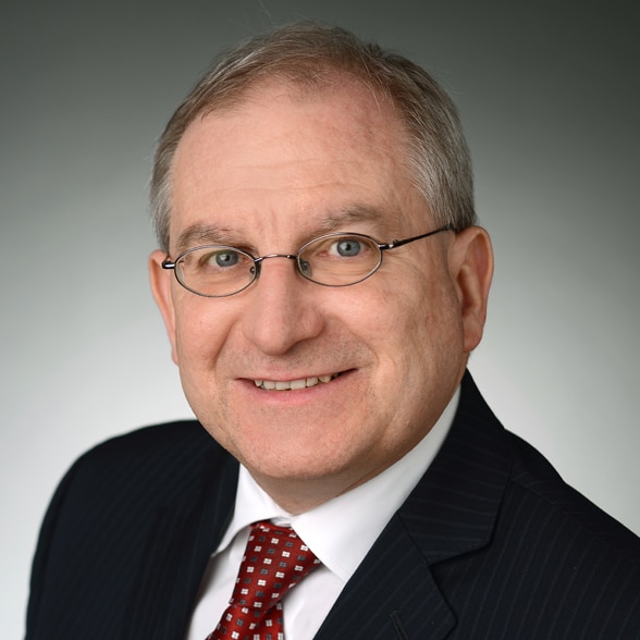 Portrait photo of Ambassador Benno Laggner.