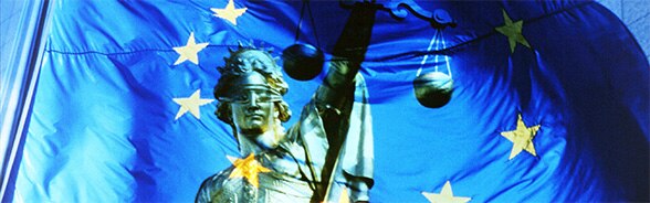 Image of the European flag and the statue of Justice