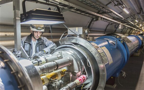 A man working on CERN’s LHC particle accelerator in Geneva