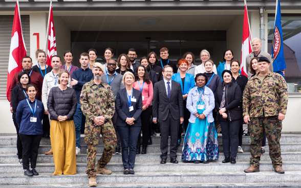 Group picture of the course participants in Stans