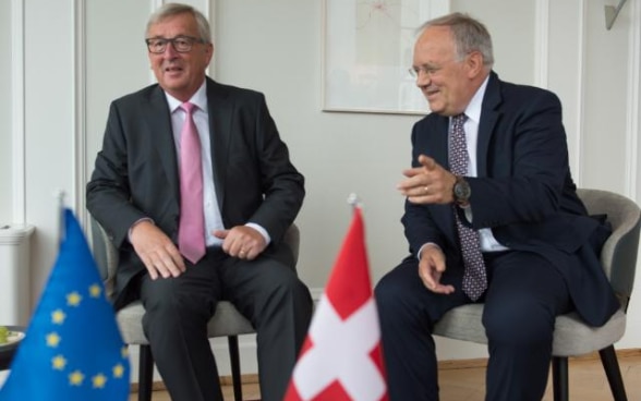 Le président de la Confédération Johann N. Schneider-Ammann et le président de la Commission européenne Jean-Claude Juncker